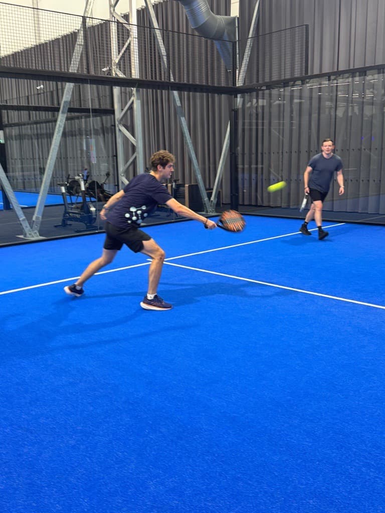 Team padel match on the indoor court