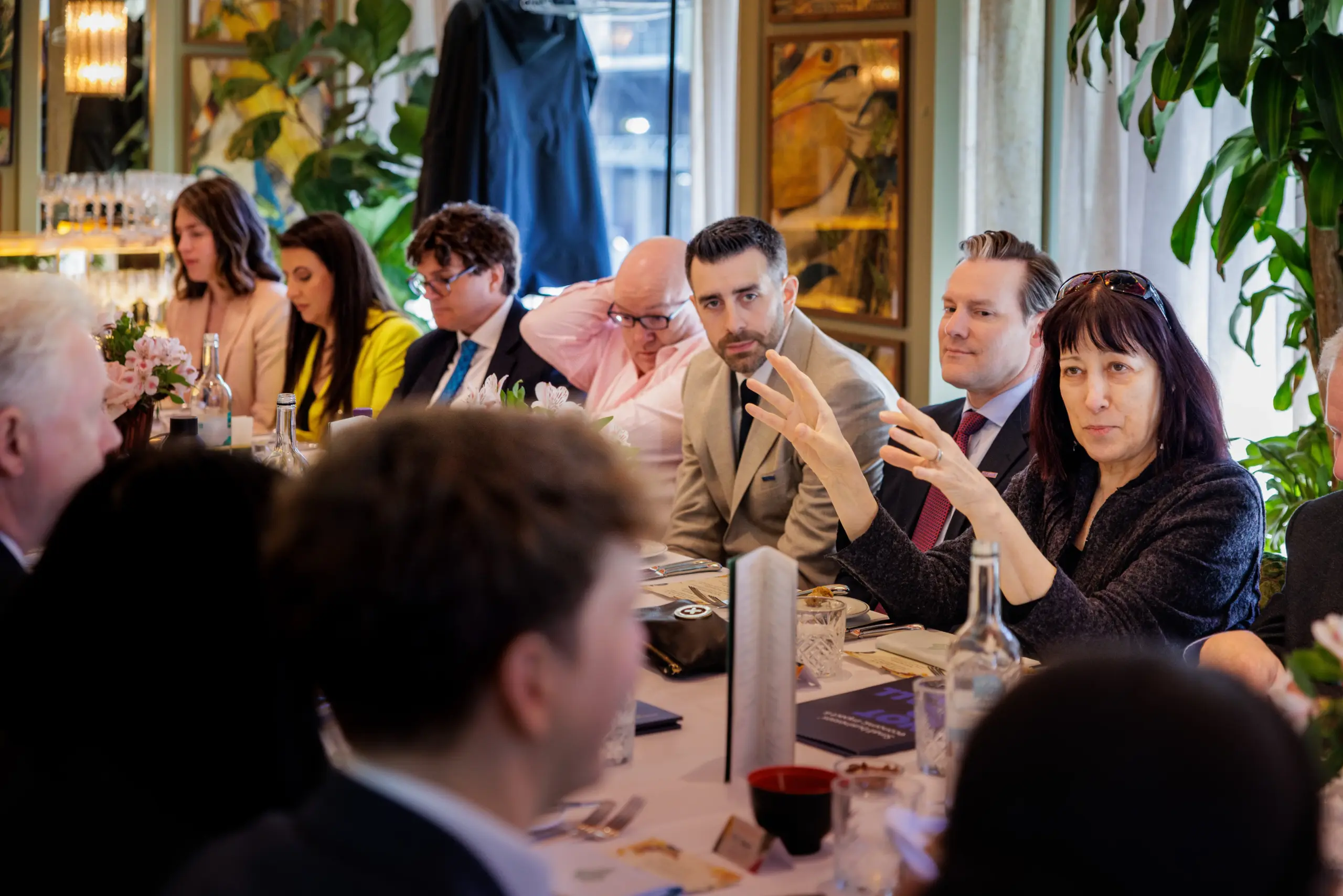 SME's picture at Intuit small business strategy group, where Andrew Price, CEO of Synapx, is also featured
