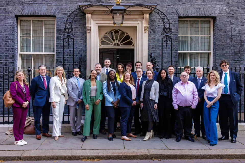 A group photo showcasing SMEs of small businesses with Intuit at 10 Downing Street, London