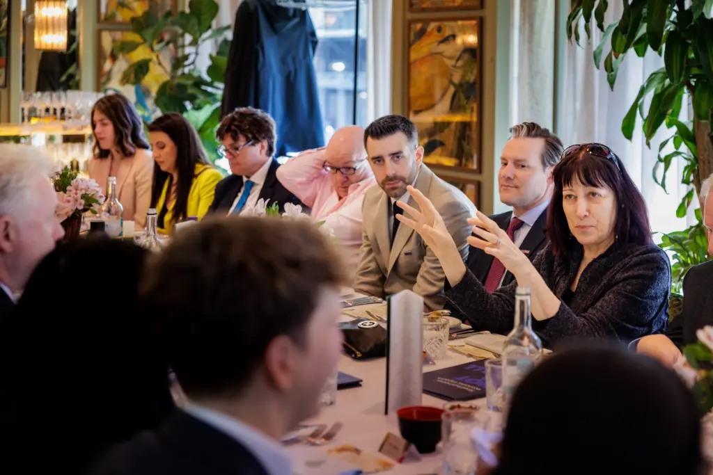 SME's picture at Intuit small business strategy group, where Andrew Price, CEO of Synapx, is also featured